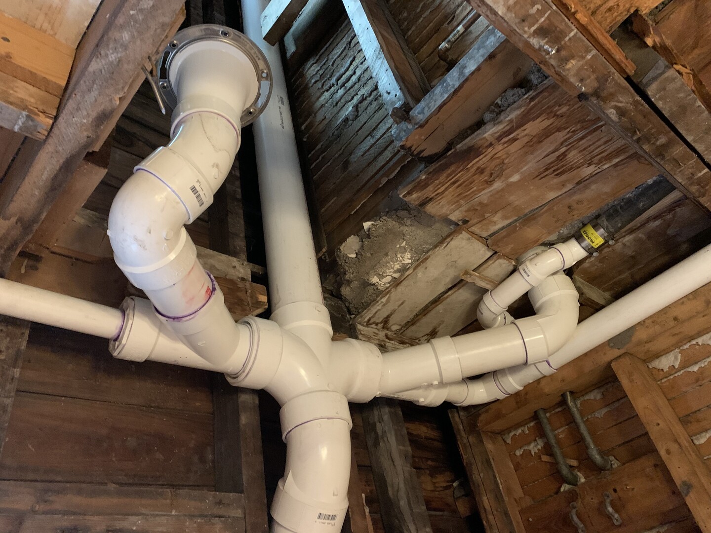 NDL plumber working on a residential plumbing system near Cayuga, Cayuga County, New York