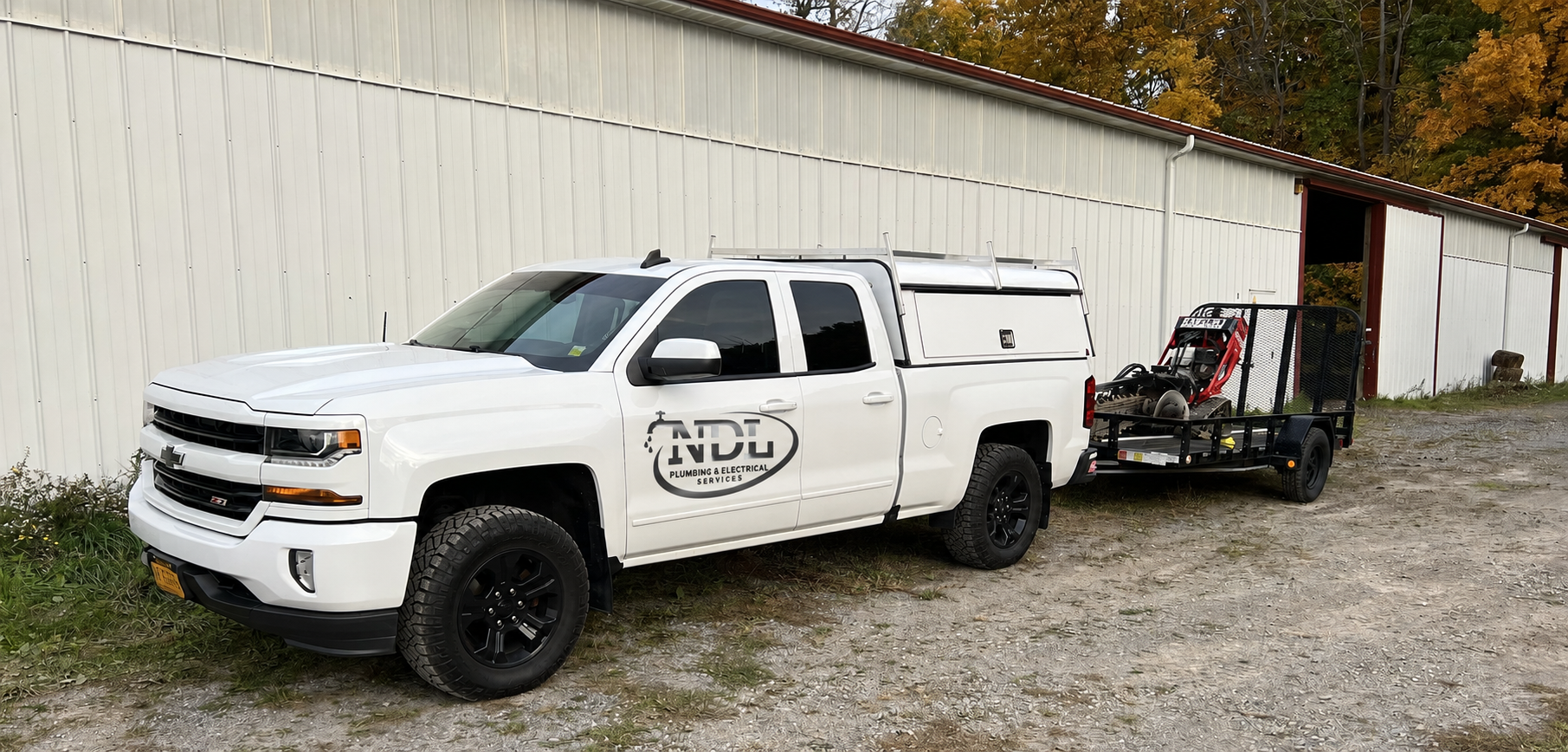 NDL Plumbing and Electrical Services technician on a residential service call in Rochester, New York